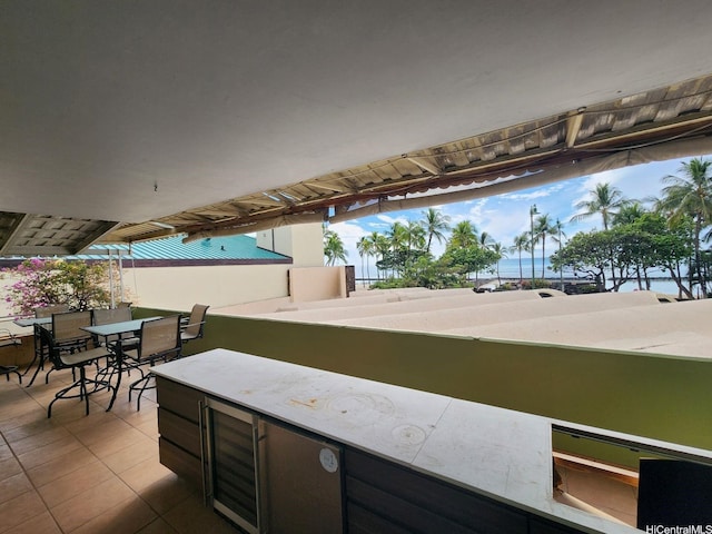 2500 Kalakaua Ave Unit 201, Honolulu, HI 96815 - view of patio with wine cooler and outdoor dining space