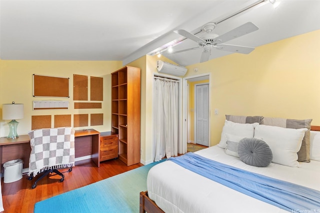 2055 Alihilani Pl, Honolulu, HI 96822 - bedroom with a wall mounted air conditioner, wood finished floors, a ceiling fan, and lofted ceiling