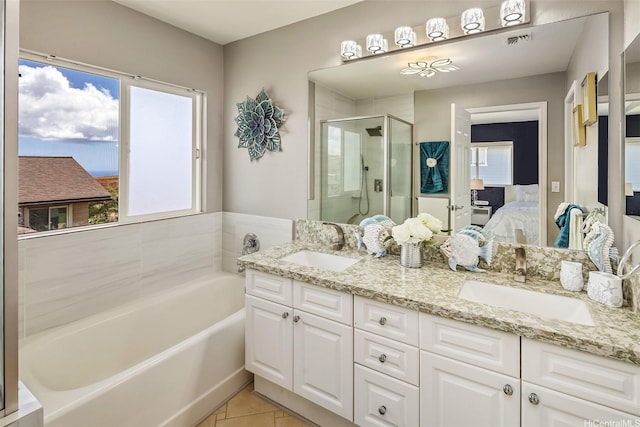 92-6127 Puapake St, Kapolei, HI 96707 - ensuite bathroom with healthy amount of natural light, a stall shower, a bath, and double vanity