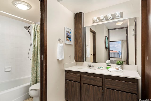 bathroom featuring shower / bath combo with shower curtain, toilet, and vanity