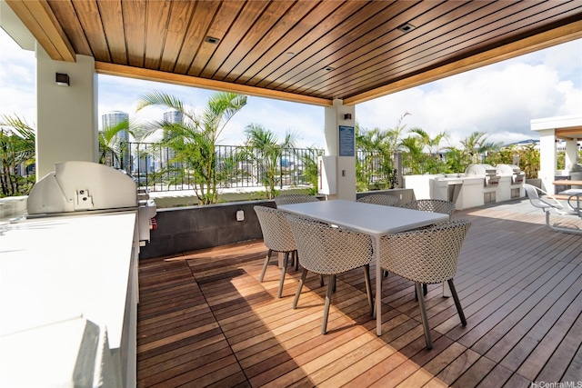 629 Keeaumoku St Unit 2205, Honolulu, HI 96814 - deck with outdoor dining area, an outdoor kitchen, and grilling area