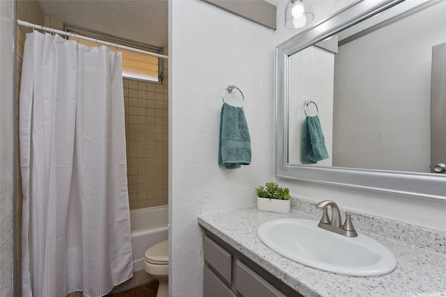 full bathroom featuring toilet, vanity, and shower / bath combo with shower curtain