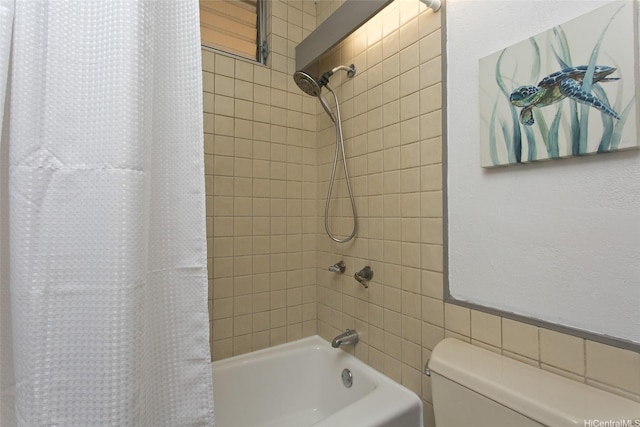 full bathroom featuring toilet, tile walls, and shower / bath combo
