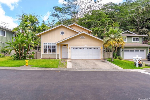 95-1007 Wikao St Unit 29, Mililani, HI 96789 - view of front of property with driveway and a front yard