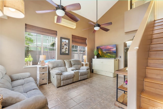 95-1007 Wikao St Unit 29, Mililani, HI 96789 - living area with ceiling fan, stairs, a wall mounted AC, and high vaulted ceiling