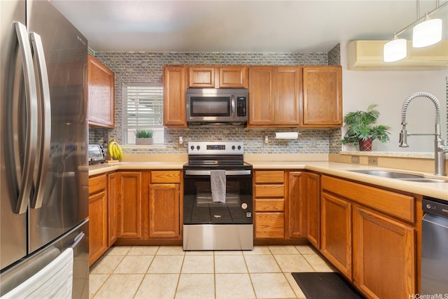 95-1007 Wikao St Unit 29, Mililani, HI 96789 - kitchen with a wall mounted AC, light countertops, stainless steel appliances, and a sink