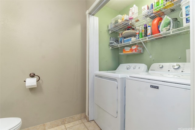 95-1007 Wikao St Unit 29, Mililani, HI 96789 - clothes washing area featuring laundry area, separate washer and dryer, and baseboards