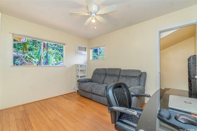 95-1007 Wikao St Unit 29, Mililani, HI 96789 - office with ceiling fan, a wall unit AC, and wood finished floors