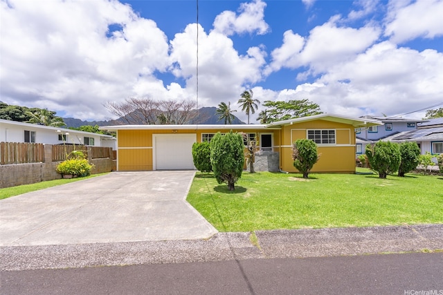 45-313 Nakuluai St, Kaneohe, HI 96744 - view of front of property featuring an attached garage and concrete driveway