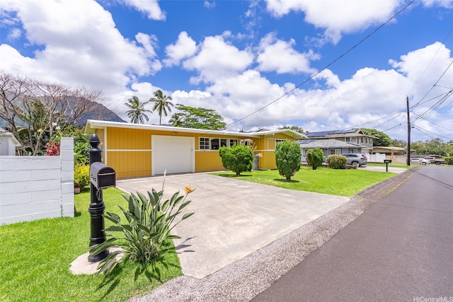 45-313 Nakuluai St, Kaneohe, HI 96744 - view of front of home featuring an attached garage and concrete driveway