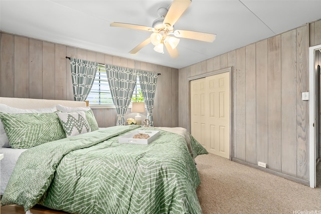 45-313 Nakuluai St, Kaneohe, HI 96744 - carpeted bedroom featuring wooden walls, a closet, and a ceiling fan
