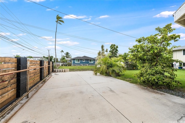 625 Maluniu Ave, Kailua, HI 96734 - view of patio / terrace with fence, concrete driveway, and a gate