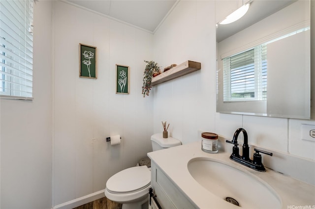 625 Maluniu Ave, Kailua, HI 96734 - half bathroom with crown molding, toilet, and vanity