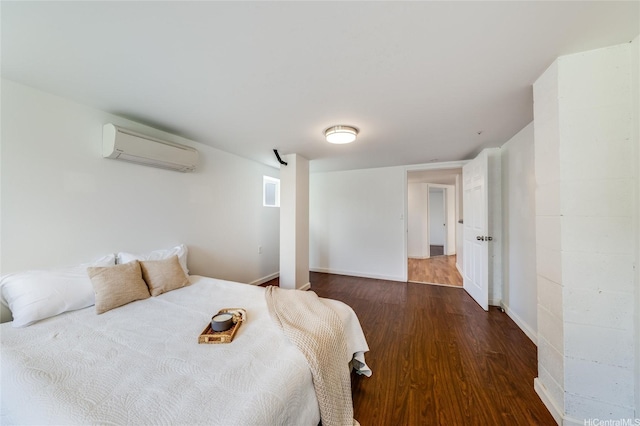 625 Maluniu Ave, Kailua, HI 96734 - bedroom featuring a wall unit AC, wood finished floors, and baseboards
