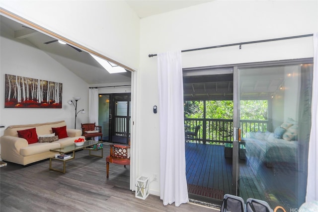 45-995 Wailele Rd Unit 8, Kaneohe, HI 96744 - living area featuring wood finished floors, a skylight, baseboards, and high vaulted ceiling