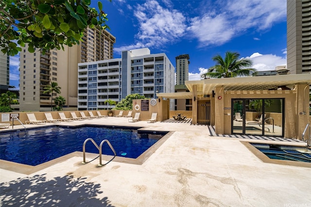 pool with a patio area