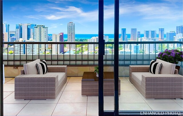 2333 Kapiolani Blvd Unit 2609, Honolulu, HI 96826 - balcony featuring a skyline view and an outdoor living space