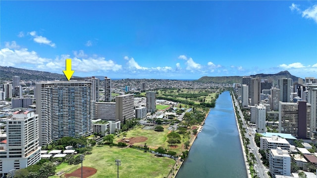 view of urban area featuring a nearby body of water