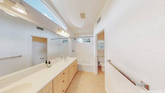 91-1040 Kaihohonu St, Ewa Beach, HI 96706 - full bathroom with tile patterned floors, double vanity, toilet, tub / shower combination, and lofted ceiling