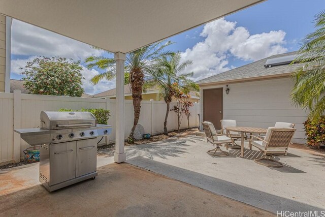 91-1040 Kaihohonu St, Ewa Beach, HI 96706 - view of patio featuring outdoor dining space, fence, and a grill