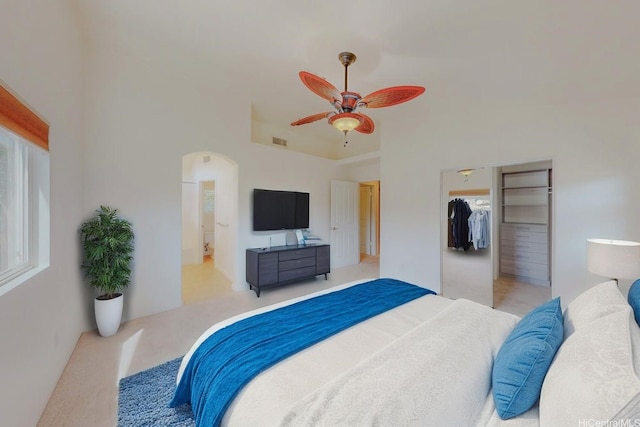 91-1040 Kaihohonu St, Ewa Beach, HI 96706 - bedroom with arched walkways, a closet, ceiling fan, and ensuite bathroom
