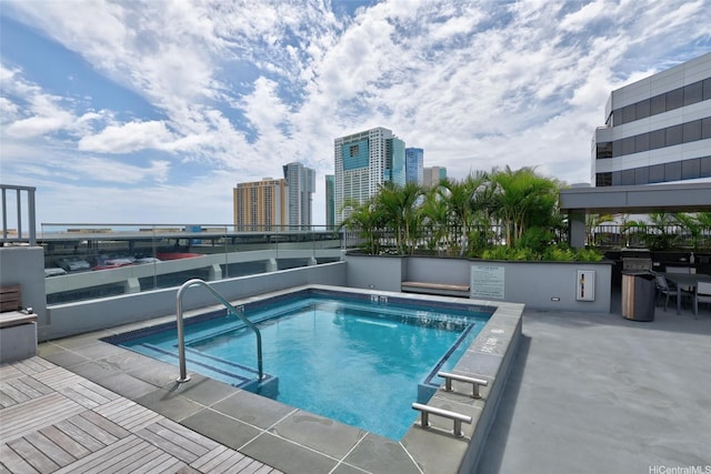 1391 Kapiolani Blvd Unit 2512, Honolulu, HI 96814 - community pool featuring a view of city and a patio