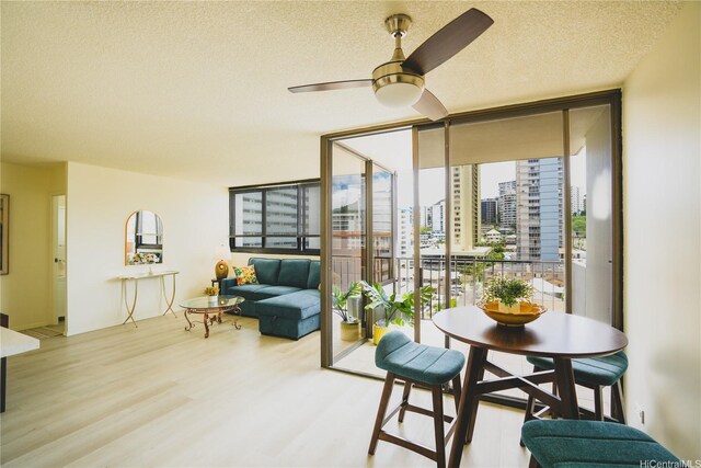 sunroom / solarium featuring a city view