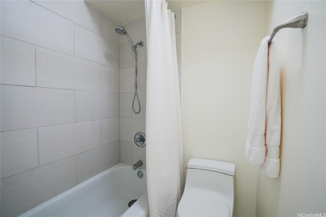 full bath with toilet and shower / tub combo