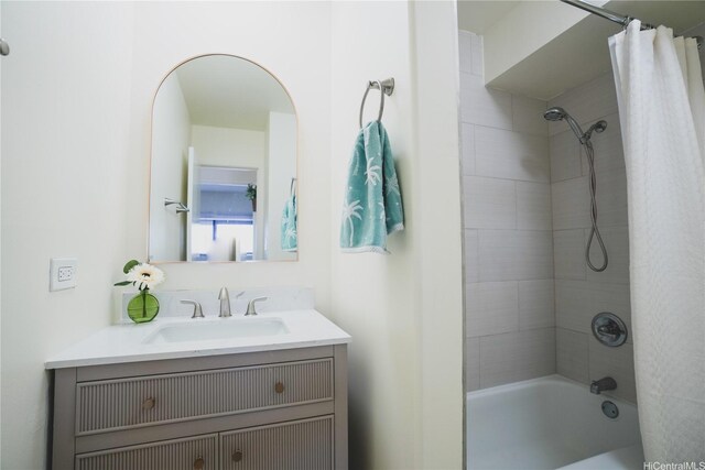 full bath with shower / tub combo and vanity