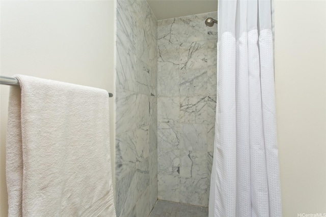 bathroom with a stall shower