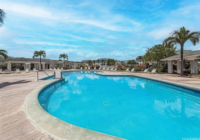 community pool featuring a patio area