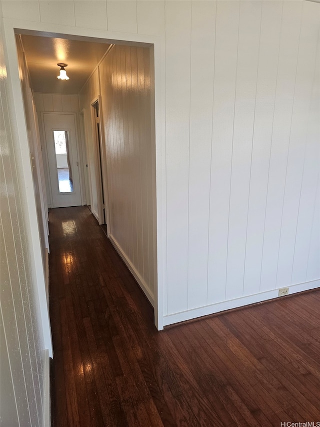 hall featuring dark wood-style flooring