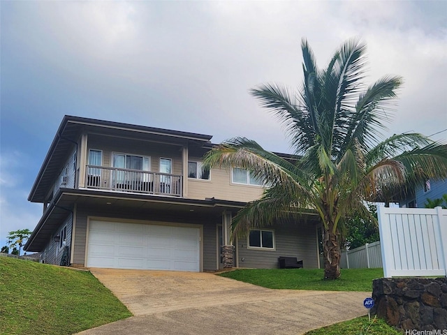 47-285 Waihee Rd Unit D, Kaneohe, HI 96744 - view of front of house featuring a balcony, a garage, driveway, and central AC unit