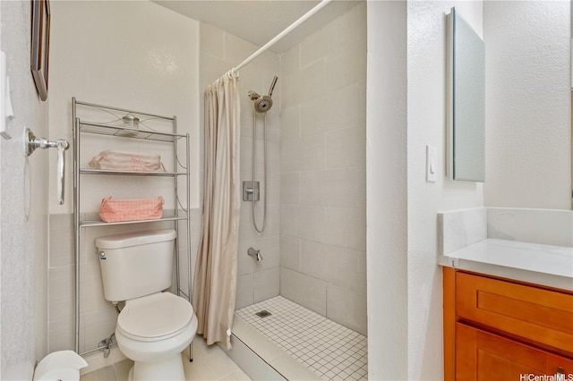 92-1044 Kanehoa Loop Unit 85, Kapolei, HI 96707 - bathroom featuring a shower stall, toilet, vanity, and tile patterned floors