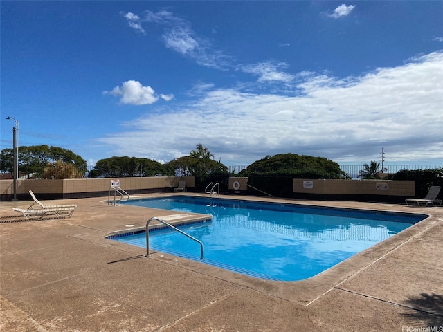 92-1044 Kanehoa Loop Unit 85, Kapolei, HI 96707 - community pool with fence and a patio
