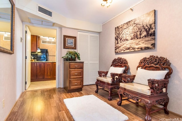 1088 Bishop St Unit 2006, Honolulu, HI 96813 - sitting room with light wood-style floors