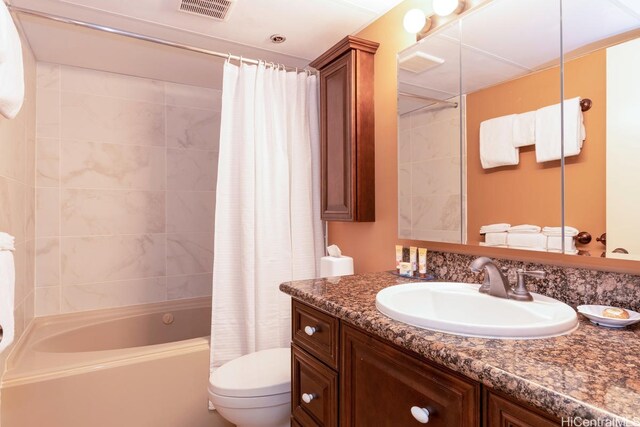 1088 Bishop St Unit 2006, Honolulu, HI 96813 - bathroom with toilet, shower / bath combination with curtain, and vanity