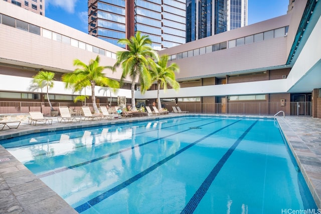 1088 Bishop St Unit 2006, Honolulu, HI 96813 - community pool featuring fence and a patio