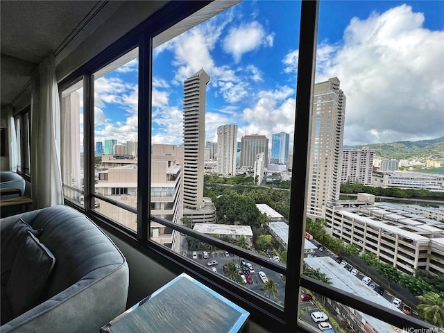 balcony featuring a skyline view