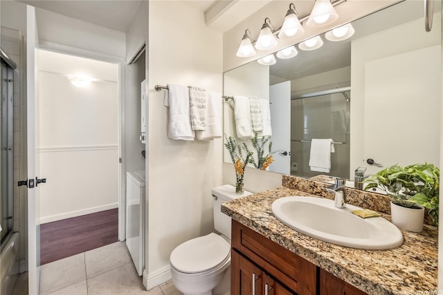 1778 Ala Moana Blvd Unit 3411, Honolulu, HI 96815 - bathroom with an enclosed shower, toilet, tile patterned floors, and vanity