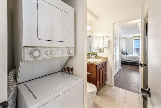 1778 Ala Moana Blvd Unit 3411, Honolulu, HI 96815 - laundry room featuring stacked washer and clothes dryer