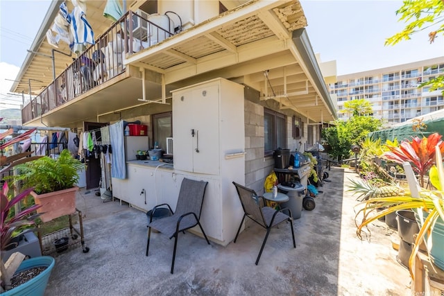 1671 Citron St, Honolulu, HI 96826 - view of patio / terrace featuring a balcony