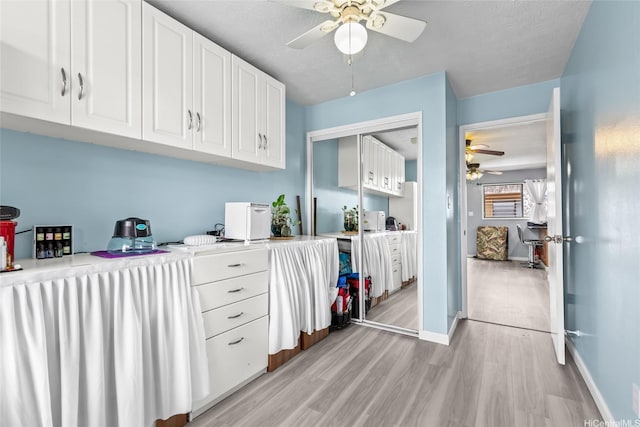3003 Ala Napuaa Pl Unit 401, Honolulu, HI 96818 - spacious closet with a ceiling fan and light wood-type flooring