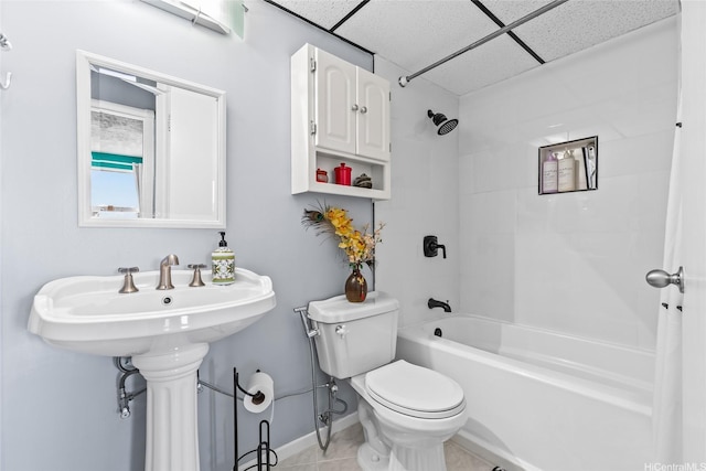3003 Ala Napuaa Pl Unit 401, Honolulu, HI 96818 - full bath with a paneled ceiling, toilet, shower / bath combination, tile patterned flooring, and baseboards