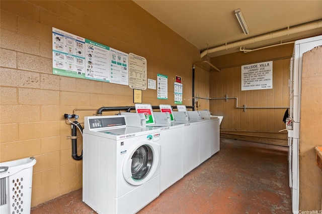 3003 Ala Napuaa Pl Unit 401, Honolulu, HI 96818 - community laundry room with separate washer and dryer and concrete block wall
