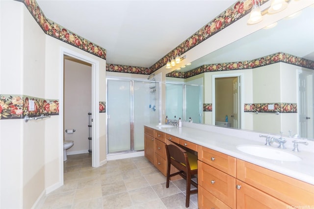 91-1027 Kaikoele St, Ewa Beach, HI 96706 - bathroom with toilet, a stall shower, double vanity, and baseboards