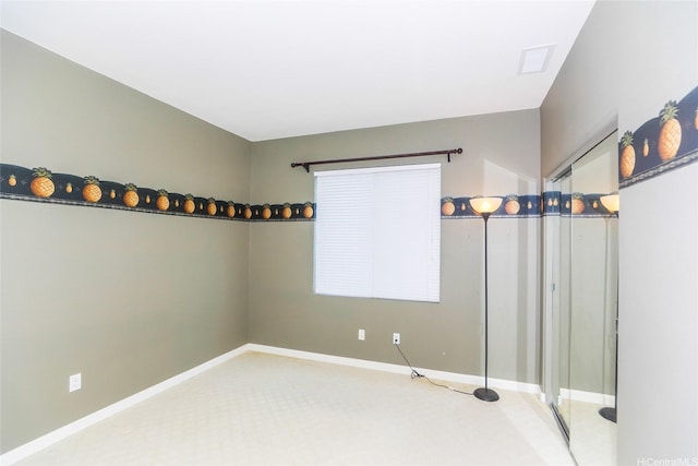 91-1027 Kaikoele St, Ewa Beach, HI 96706 - carpeted empty room featuring baseboards