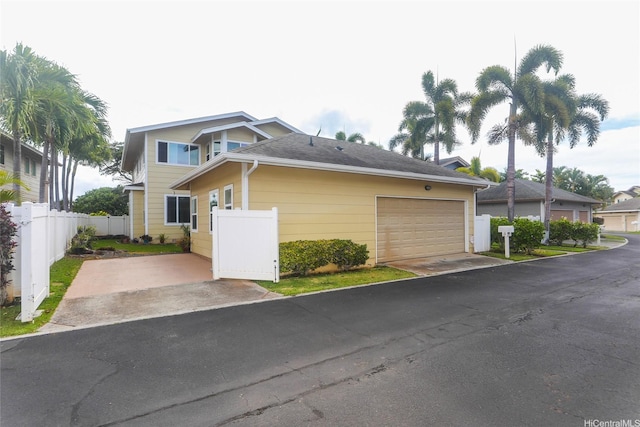 91-1027 Kaikoele St, Ewa Beach, HI 96706 - view of front of home with fence and driveway