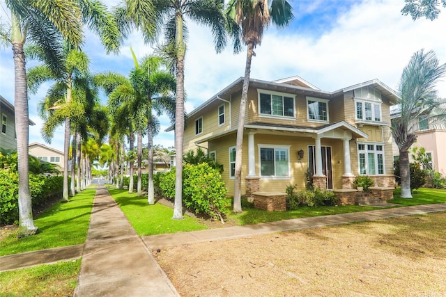 91-1027 Kaikoele St, Ewa Beach, HI 96706 - view of side of property with a yard