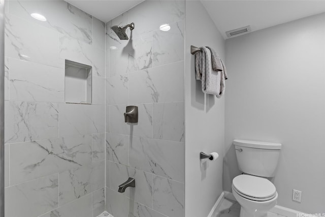 750 Kaheka St Unit 901, Honolulu, HI 96814 - full bathroom featuring tiled shower, toilet, and baseboards